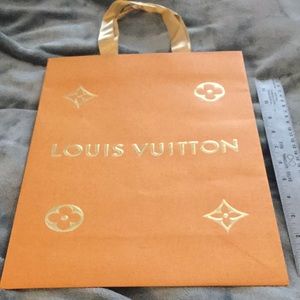 Empty Louis Vuitton shopping bag